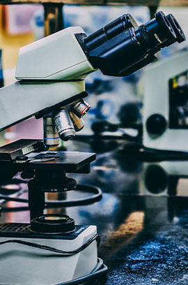 Microscopes on table.